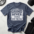The Grind Never Cares Dark Tee