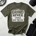 The Grind Never Cares Dark Tee