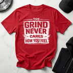 The Grind Never Cares Dark Tee