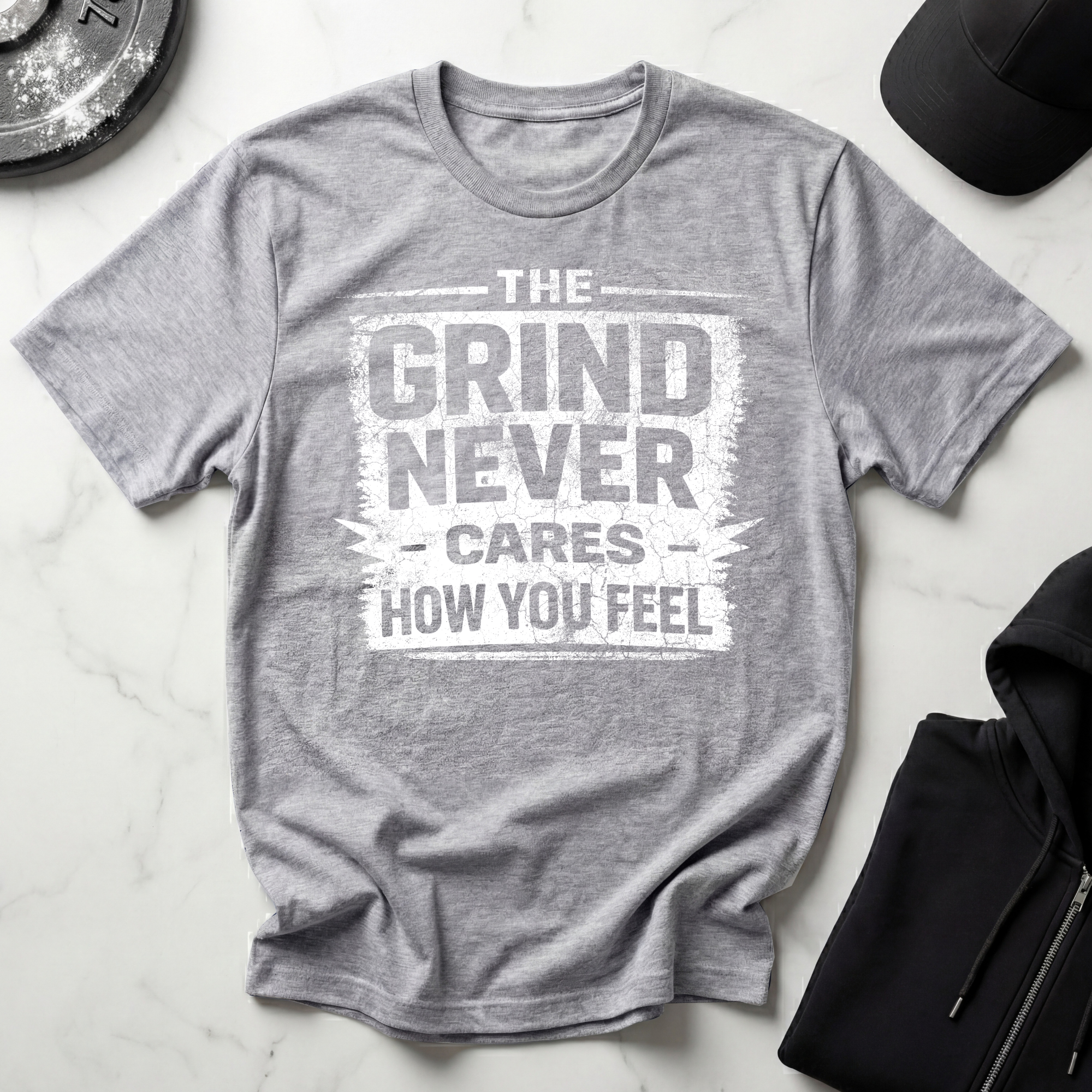 The Grind Never Cares Dark Tee